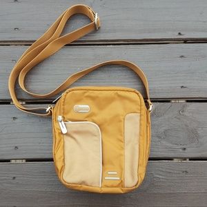 Tumi Tech tan crossbody bag
